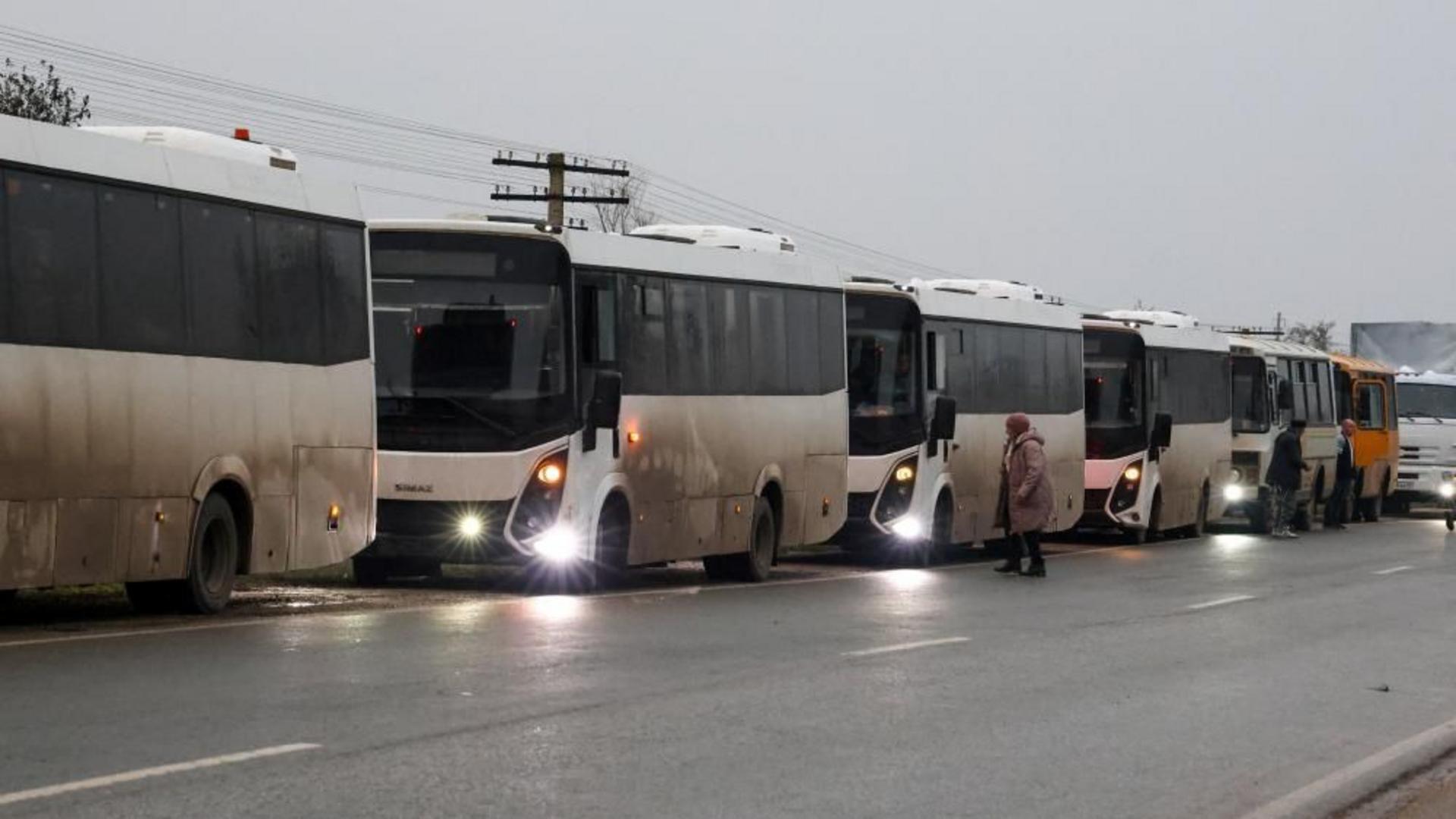 Evacuees from Russia-occupied city where residents ate weeds on way to Ukraine